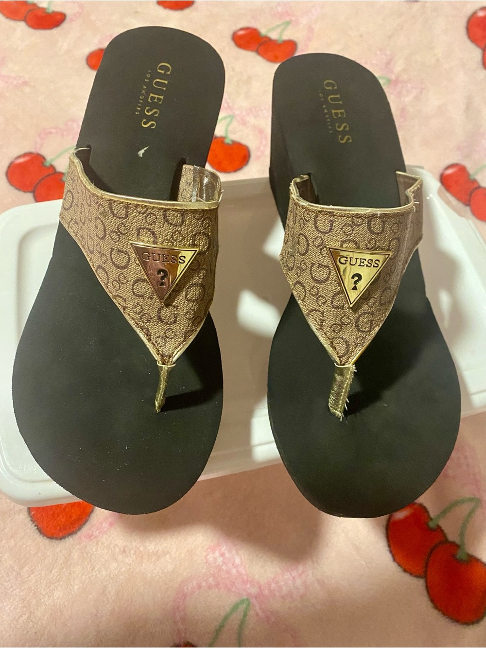 GUESS Tan Logo Thong Sandals with Gold Triangle Emblem